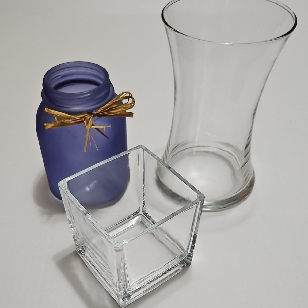 Bundle of Clear Glass and Blue Vases